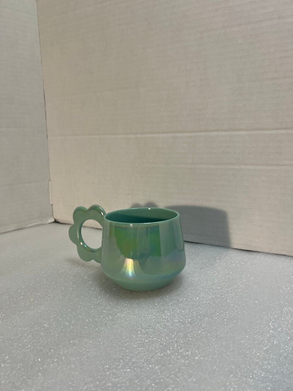 Thyme & Table  Collectors Coffee Cup.  Aqua Green with a Flower Handle